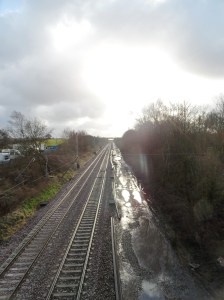 Waterlogged railway - engineers on Bank Holiday overtime in the very distance