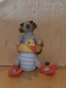 No one wants to see a picture of me in a swimming costume, please accept a knitting flipper-wearing meerkat as an alternative. 